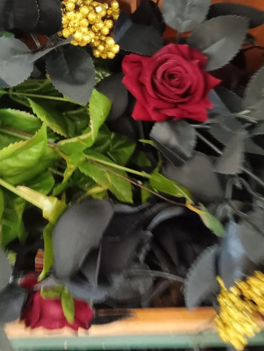 Source Unknown Black Rose and Green Leaf Garland with Yellow Berry Accents